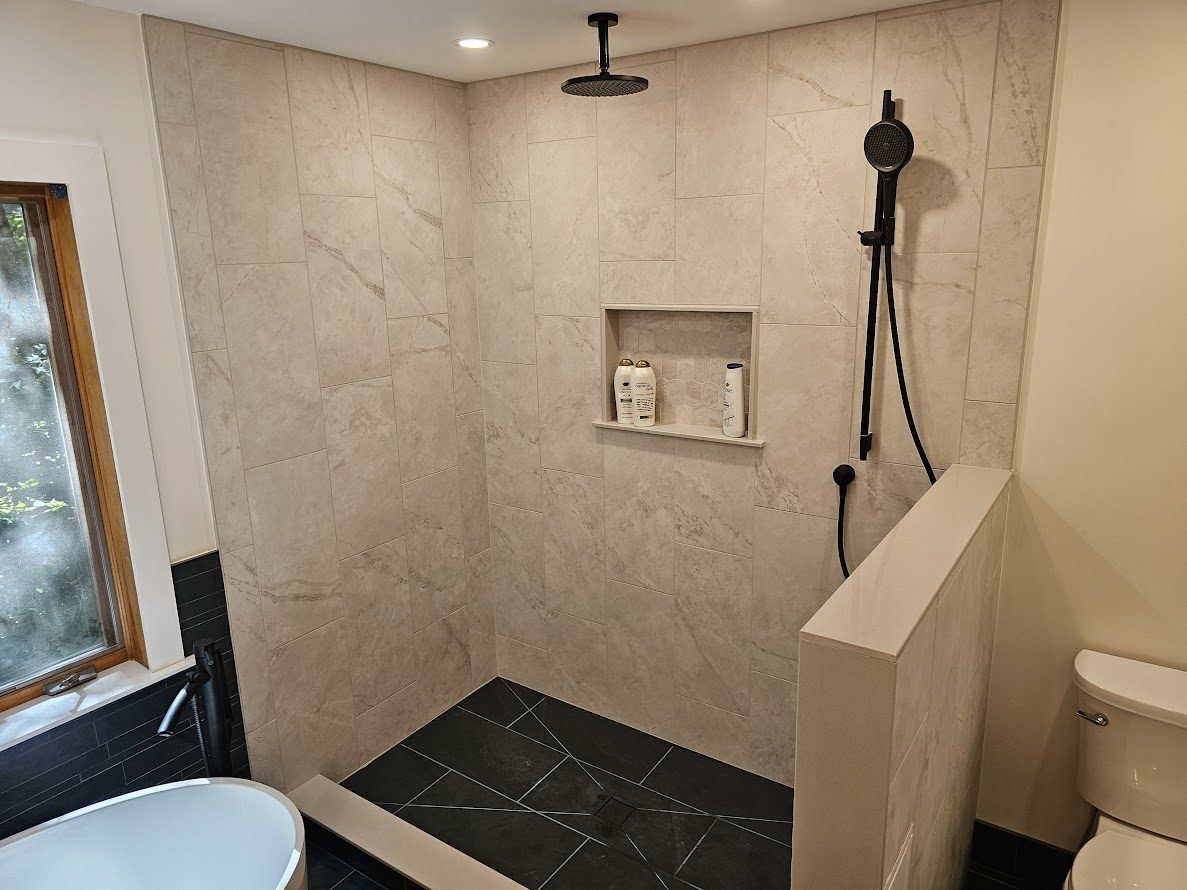 Cotoctin — walk-in shower with ceiling-mount rain head, marble tile, and built-in niche